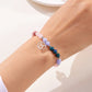 12 Zodiac-stenen kralenarmband met astrologisch tekenbedeltje