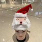 Interactieve pluche kerstmuts met kerstfiguur