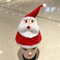 Interactieve pluche kerstmuts met kerstfiguur