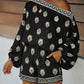 Bohemian jumpsuitset met schoudervrije pasvorm en print