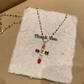 💎 50% KORTING!! ✝️ Kleurrijke ketting met kruisvormige hanger van strass – levendige glinstering, verstelbare lengte en een betekenisvol statement ✨