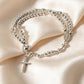 Armband met rozenkranskralen en dubbele wikkel