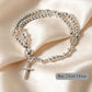 Armband met rozenkranskralen en dubbele wikkel
