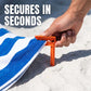 Windbestendige strandhanddoekklemmen voor zand en gras
